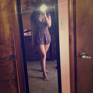 Purple floral romper from urban outfitters.